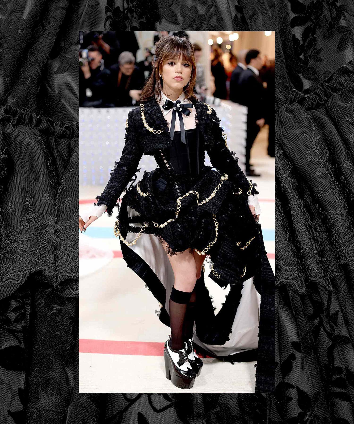 Jenna Ortega in a dress with black ruffles