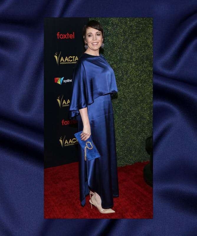 Olivia Coleman in a blue satin dress